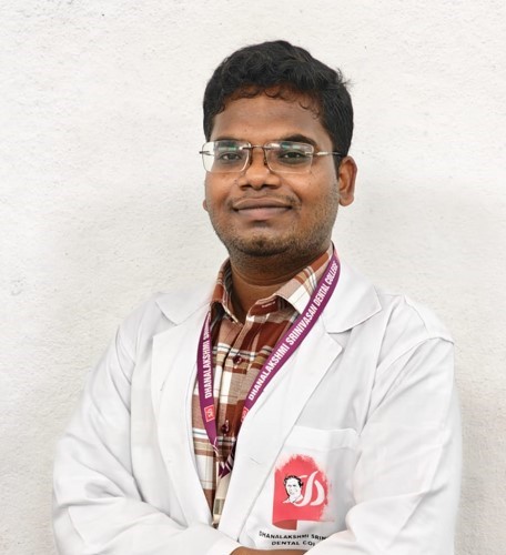 Dr. Vignesh D